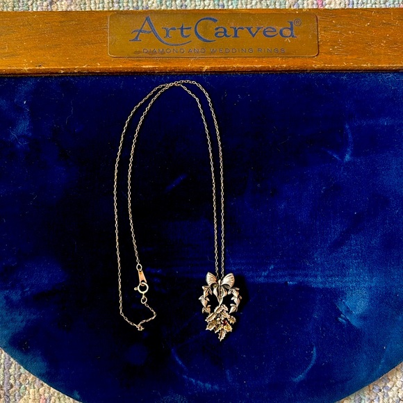 Franklin Mint Jewelry - Vintage 1982 Sterling silver Franklin Mint “The Love So True” Ruby Bow Pendant